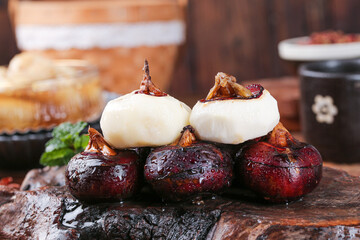 Grilled Horseshoe Crab with Sea Salt - Traditional Guangxi Chinese Seafood Cuisine on Wooden Board