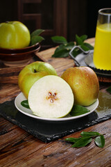 Fresh Shanxi Pears with Juice - Crispy Fragrant Fruit Harvest Display on Rustic Wood Table