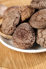 Fresh Dried Shiitake Mushrooms on White Plate - Asian Cooking Ingredients