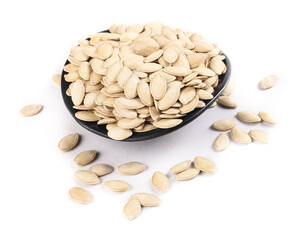 Raw Pumpkin Seeds in Black Bowl on White Background - Healthy Snack Food Ingredient