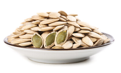 Raw Pumpkin Seeds in White Bowl on Clean Background - Healthy Snack and Cooking Ingredient
