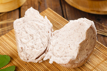 Handmade Whole Wheat Buckwheat Buns Sliced on Bamboo Mat - Artisan Bread