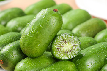 Fresh Baby Kiwi Fruits with Water Drops - Small Green Tropical Fruit Collection