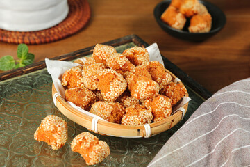Crispy Sesame Balls Guangxi Chinese Snack Traditional Fried Food in Bamboo Basket