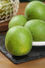 Fresh Luo Han Guo Monk Fruit from Guilin Yongfu - Natural Green Herbal Tea Ingredient on Slate Board