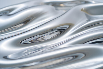 Close-up of a tin can with a metallic liquid pattern on a white background
