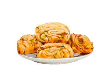 Savory Pork and Cheese Rolls with Herbs on White Plate Isolated Background