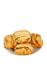 Golden Pork Rolls Sliced on White Plate Isolated on White Background