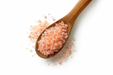 Wooden spoon filled with pink Himalayan salt crystals isolated on white background for cooking seasoning health and spa wellness concept