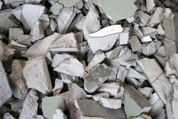Broken concrete, Piles of lightweight construction bricks after house demolition