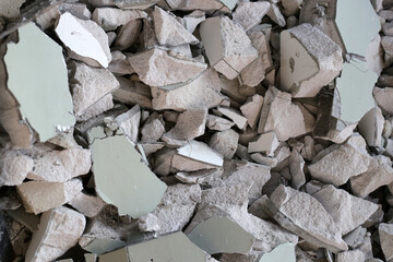 Broken concrete, Piles of lightweight construction bricks after house demolition