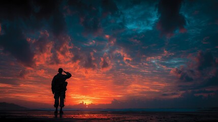 Soldier saluting silhouette against dramatic sunset sky, Veterans Day or Army Day concept, symbolizing service and sacrifice, copy space for text.
