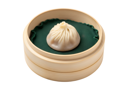 A single, delicate baozi sits nestled in a traditional bamboo steamer, showcasing its light beige color and intricate pleats.