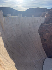 A breathtaking and stunning view showcasing a modern concrete dam amid the scenic landscape