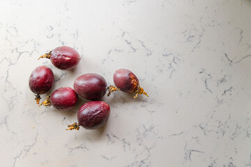 delicious and juicy exotic fruit - passion fruit on a kitchen counter, natural light