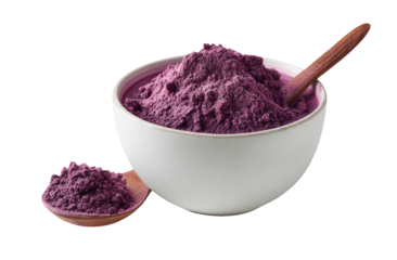 Purple powder in white bowl with wooden spoon
