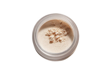 Light beige powder in a clear, round container