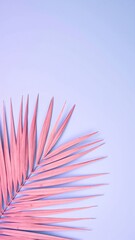 A vibrant pink palm leaf gracefully rests against a bright blue background, creating a striking contrast that highlights the leaf's intricate details and textures.