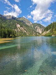 Reflection on the surface of a lake in summer in Jiuzhaigou National Park, China.