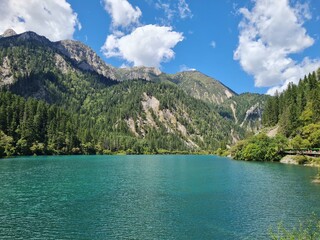 The azure blue of Long Lake in summer in Jiuzhaigou National Park, China.