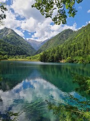 Reflection on the surface of a lake in summer in Jiuzhaigou National Park, China.