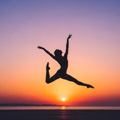 Silhouette of a dancer leaping during a vibrant sunset