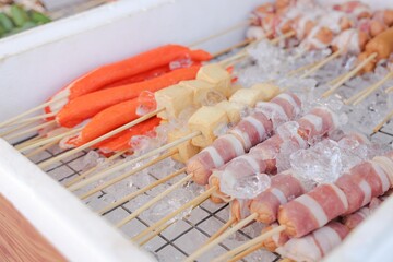 Skewered Delights: A culinary symphony of vibrant skewers beckons, showcasing a diverse array of delicious treats arranged artfully on ice, ready to tempt and delight.