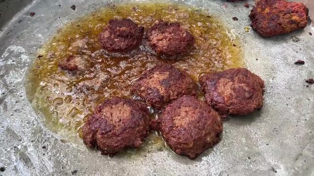Galouti kebab prepared in hot oil in India