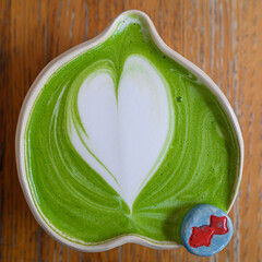 macha latte on the table in the coffee shop