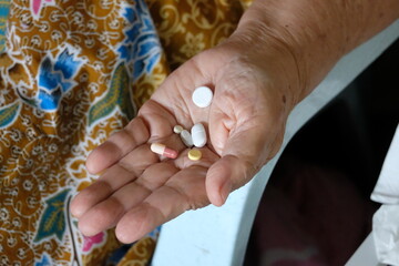 The Hope in a Palm, A Glimpse of Healing Held by a Hand That Has Known the Weight of Time.