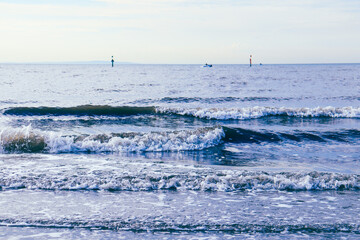 boat in the water in rough winter waves