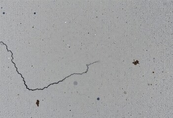 Rough, mottled grey cement surface with visible aggregate,  aged,  weathered