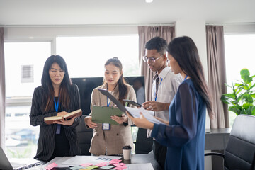 Business asian Multicultural businesspeople working project  working together in office conference ideas in startup at office Diversity leadership and business people