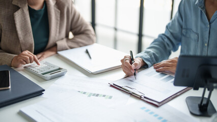 business man Auditor or internal revenue service staff checking annual financial statements company...