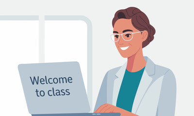 Smiling woman in lab coat with laptop displaying Welcome to class.