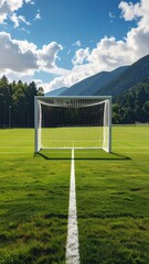 Scenic Soccer Goal on Green Field with Majestic Mountains in Background