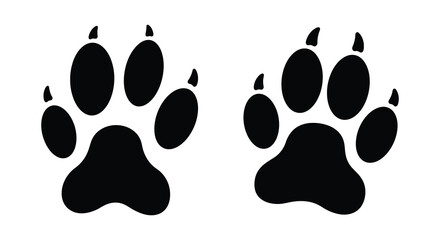 Fototapeta premium Two black animal paw prints displayed on a clean white background