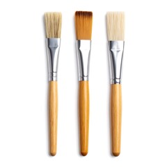 Naklejka premium Three paintbrushes on white background