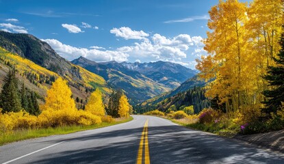 Scenic mountain road winding through golden autumn foliage