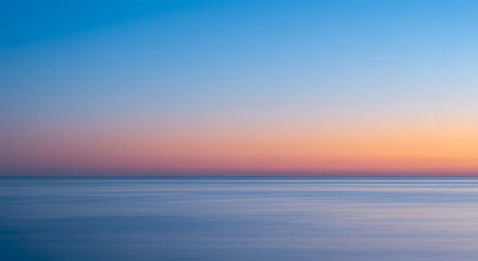 Obraz premium Sunrise over water blurred