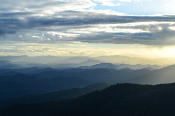 Fototapeta premium Landscape Sunset in Twilight time Over the Mountains in the Evening at Doi Suthep-Pui National Park,Chiang mai, Northern Thailand.