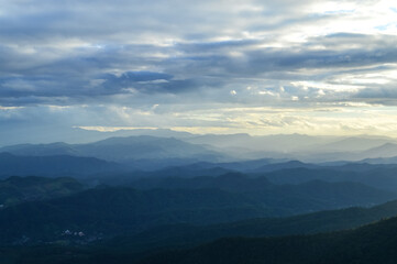 Naklejka premium Landscape Sunset in Twilight time Over the Mountains in the Evening at Doi Suthep-Pui National Park,Chiang mai, Northern Thailand.