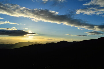 Fototapeta premium Landscape Sunset in Twilight time Over the Mountains in the Evening at Doi Suthep-Pui National Park,Chiang mai, Northern Thailand.