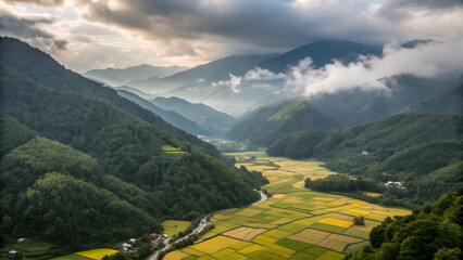 Dramatic mountain valley landscape with contrasting sky and lush greenery under moody clouds