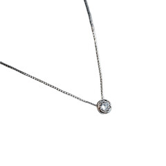 Fototapeta premium Delicate silver necklace with small stone