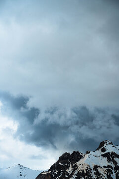 Clouds over a mountain range in the Alps