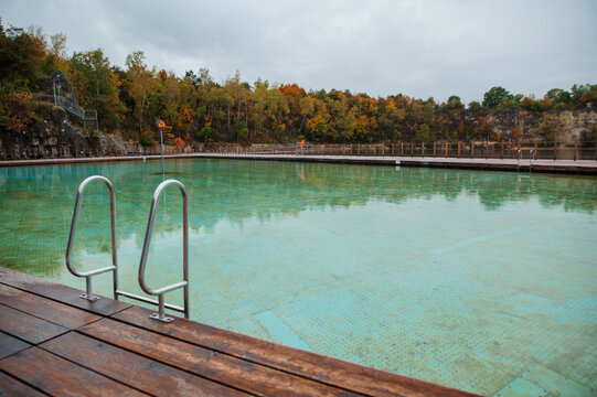 Zakrz&oacute;wek Quarry, Krakow. Floating swimming pool. Cloudy autumn day
