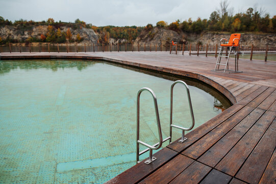 Zakrz&oacute;wek Quarry, Krakow. Floating swimming pool. Cloudy autumn day