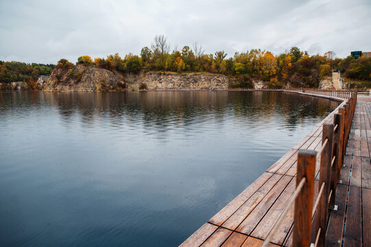 Zakrz&oacute;wek Quarry, Krakow. Floating swimming pool. Cloudy autumn day