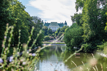 Warsaw, Poland, Lazienki Park, Elegant castle surrounded by lush greenery and tranquil waters, showcasing stunning architecture and royal legacy, perfect for summer travel and exploration